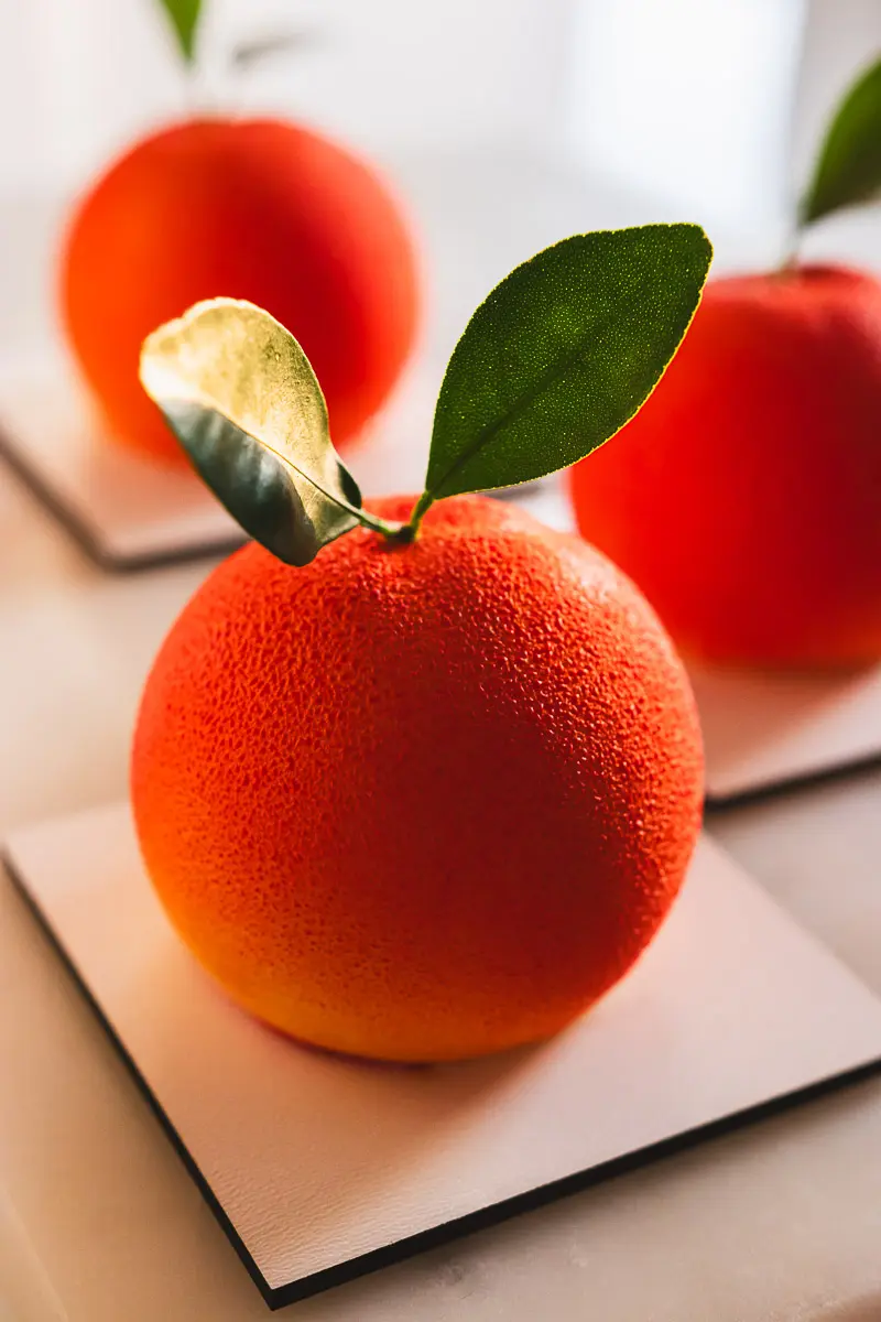 Deser czekoladowo musowy w kształcie pomarańczy